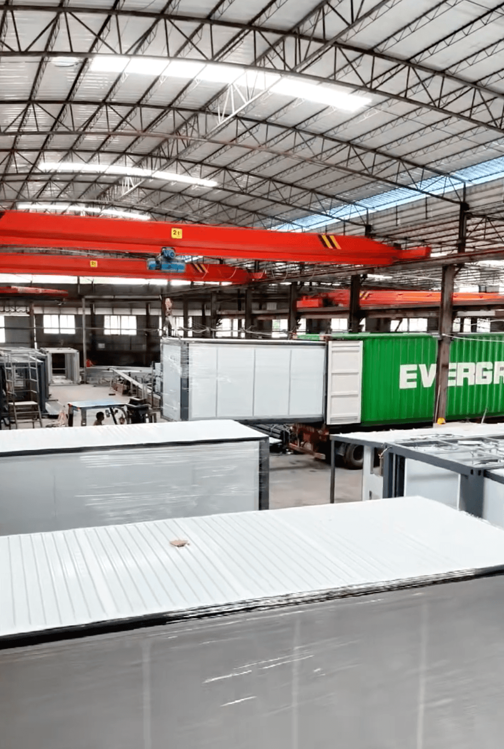 Factory floor — production line overview with overhead crane