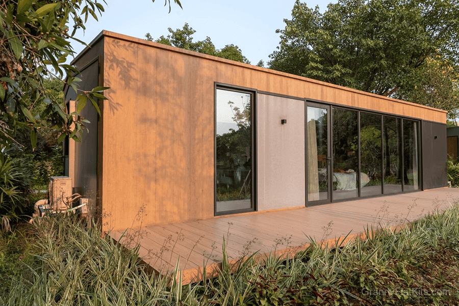 Modular granny flat side view with traditional pitched roof design