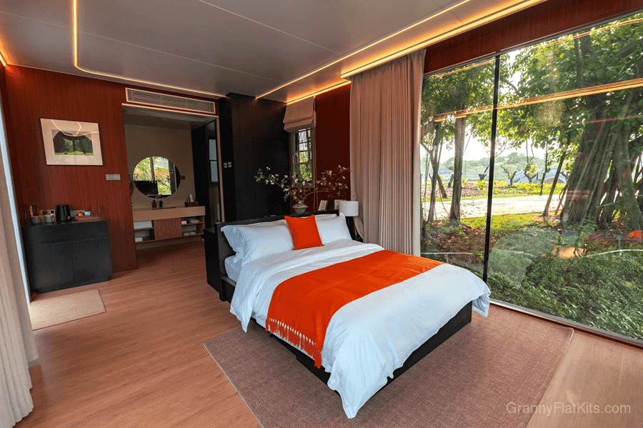 Premium bedroom interior with floor-to-ceiling glass and warm LED lighting