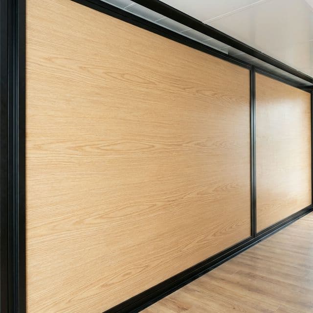 Warm wood-grain interior of an expandable granny flat