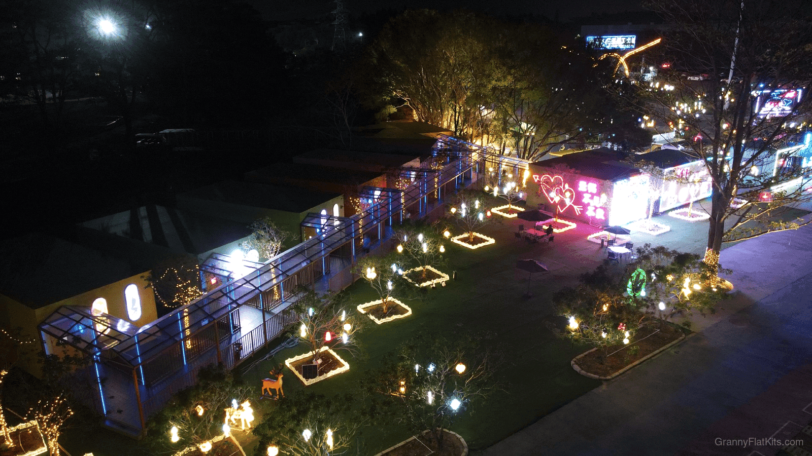 Completed modular commercial street with active businesses in operation