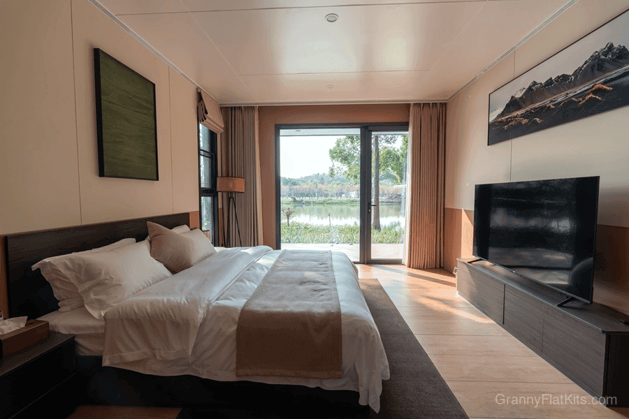 Granny flat bedroom with panoramic windows