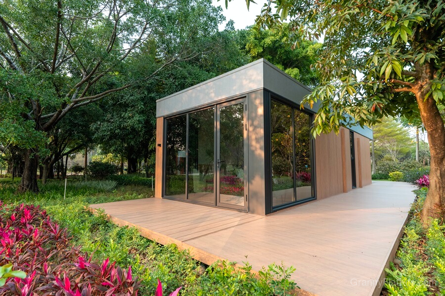 Granny flat kit home showing extended length and glass facade